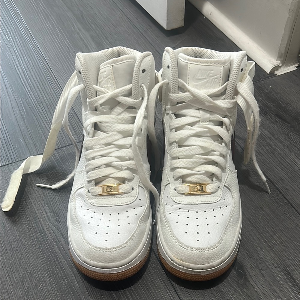 Nike High-Top Sneakers with Gold Accents